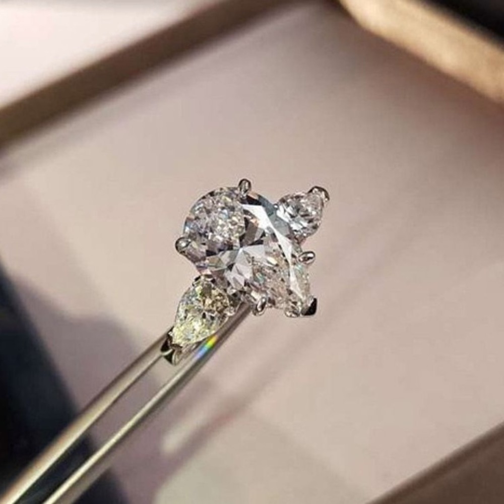3ctw Pear Three Stone Ring in Sterling Silver White Sapphire - Picture 3 of 12